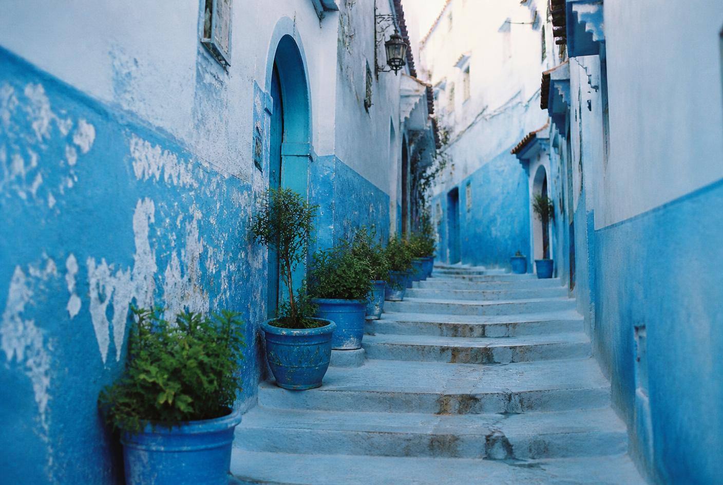 Blue-washed alley and stairway in Chefchaouen, Morocco