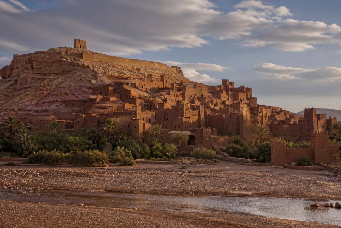 Earthen kasbah architecture near Ouarzazate at golden hour
